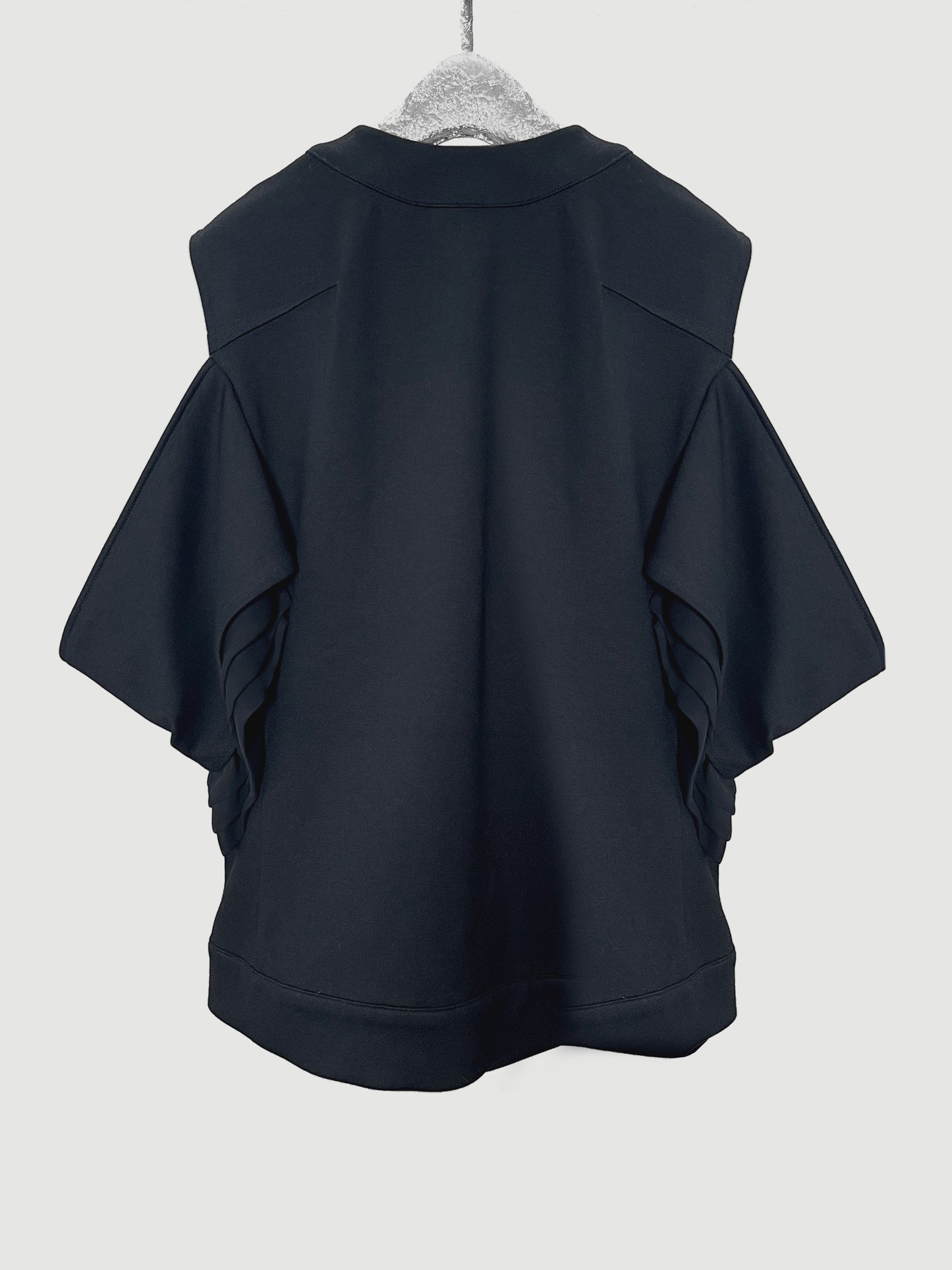 Ruffled sleeveless cardigan