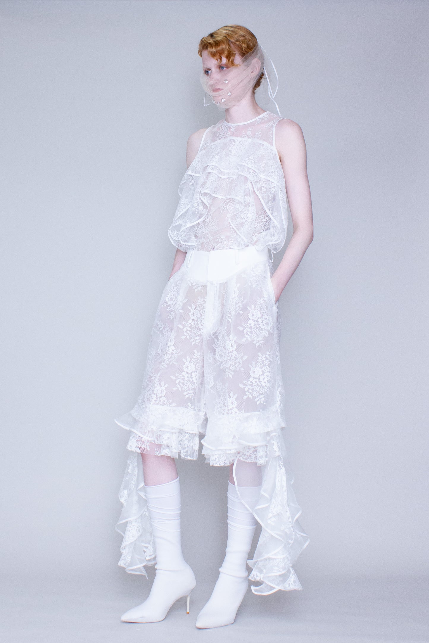 Ruffle-hemmed cropped tailored pants